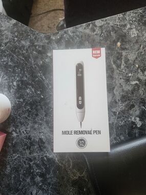Mole Removal Pen - White & Black Packaging